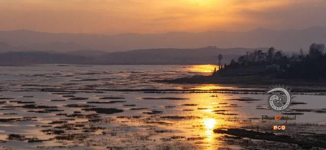 《夕染草海》
